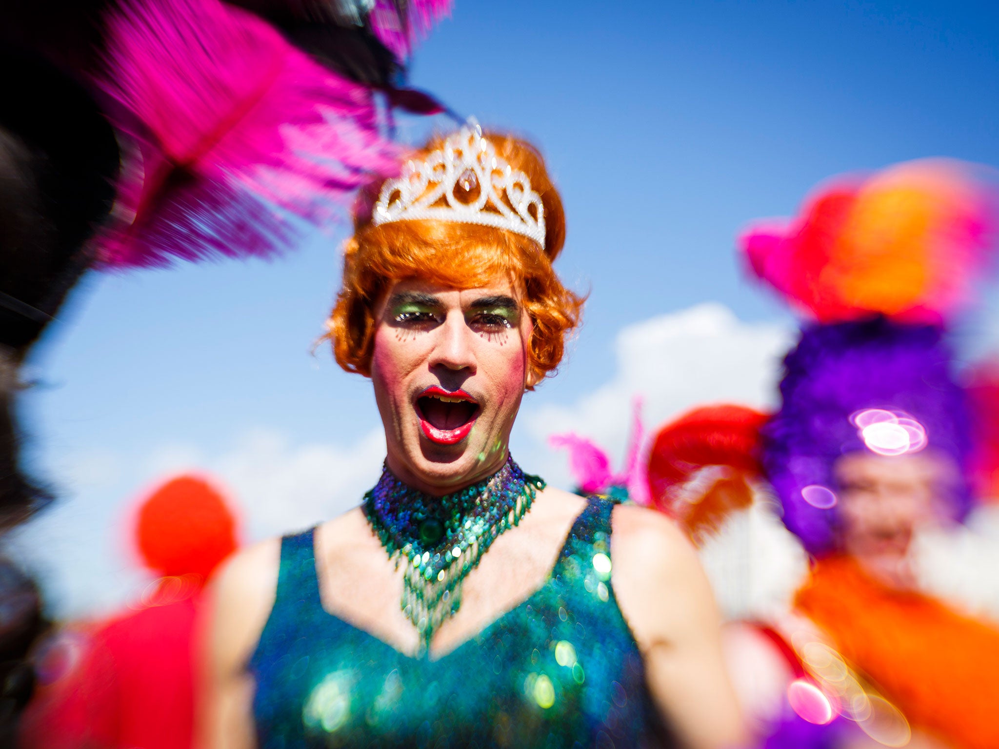 A sequined reveller takes part in the parade at Brighton Pride