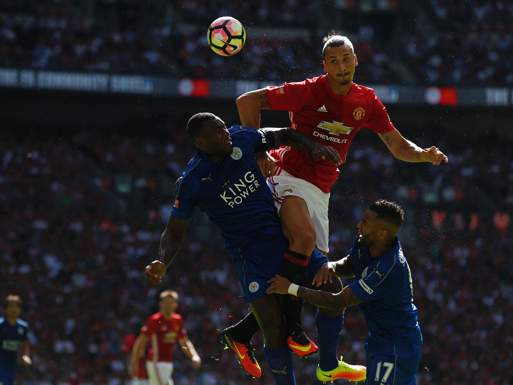 &#13;
Ibrahimovic leaps to head the ball during United's Community Shield clash with Leicester &#13;