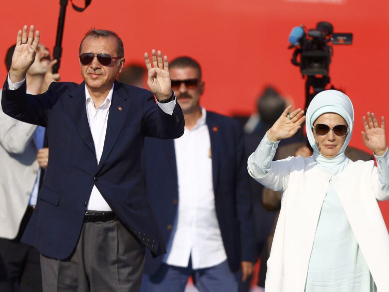 Turkish President Tayyip Erdogan and his wife Emine Gulbaran attend Democracy and Martyrs Rally