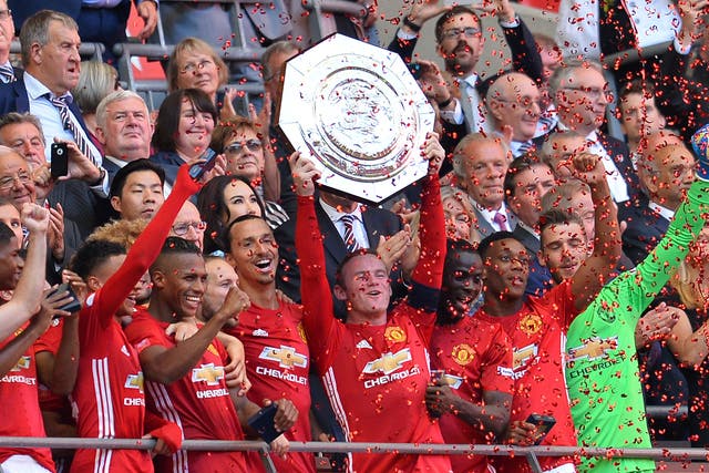 Wayne Rooney lifts the Community Shield after Manchester United's 2-1 win over Leicester City