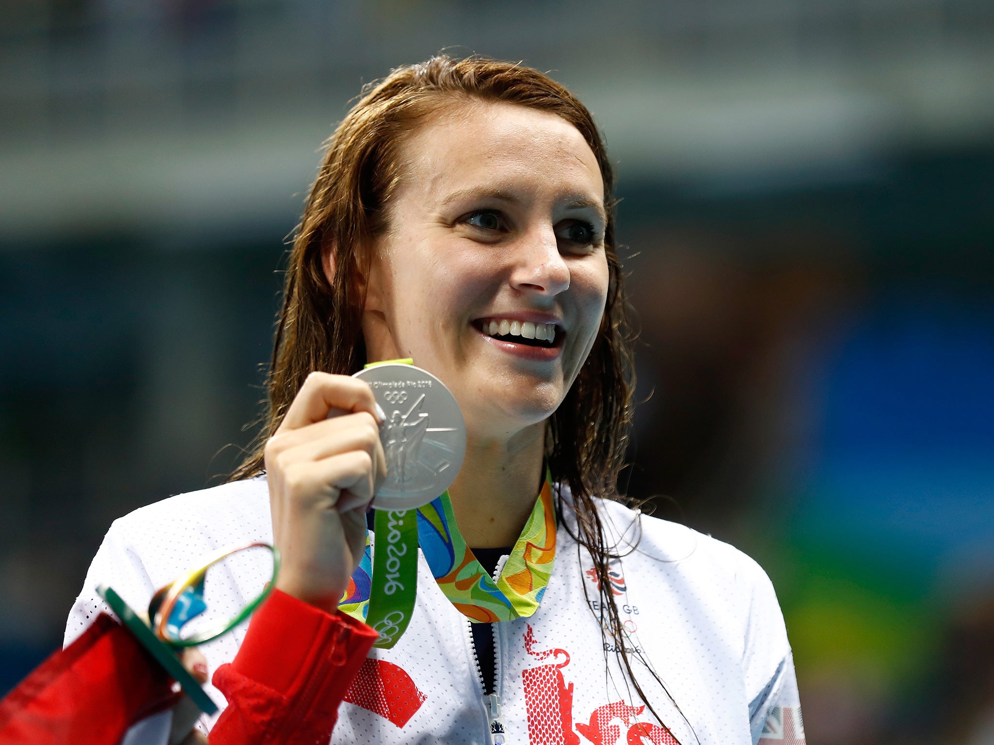 Carlin proudly shows off her silver medal