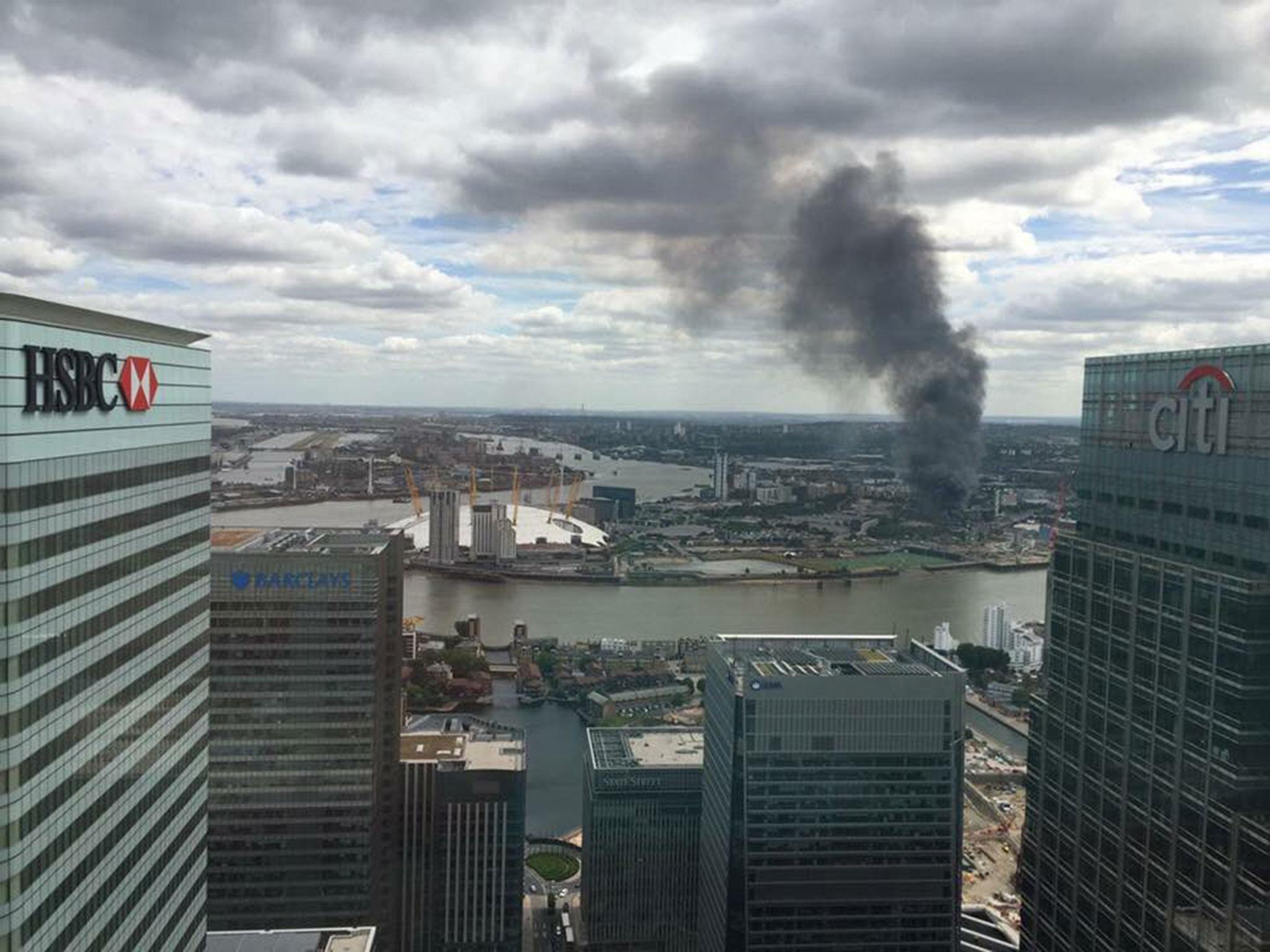 
The fire could be seen from across London. Pictured in Canary Wharf 