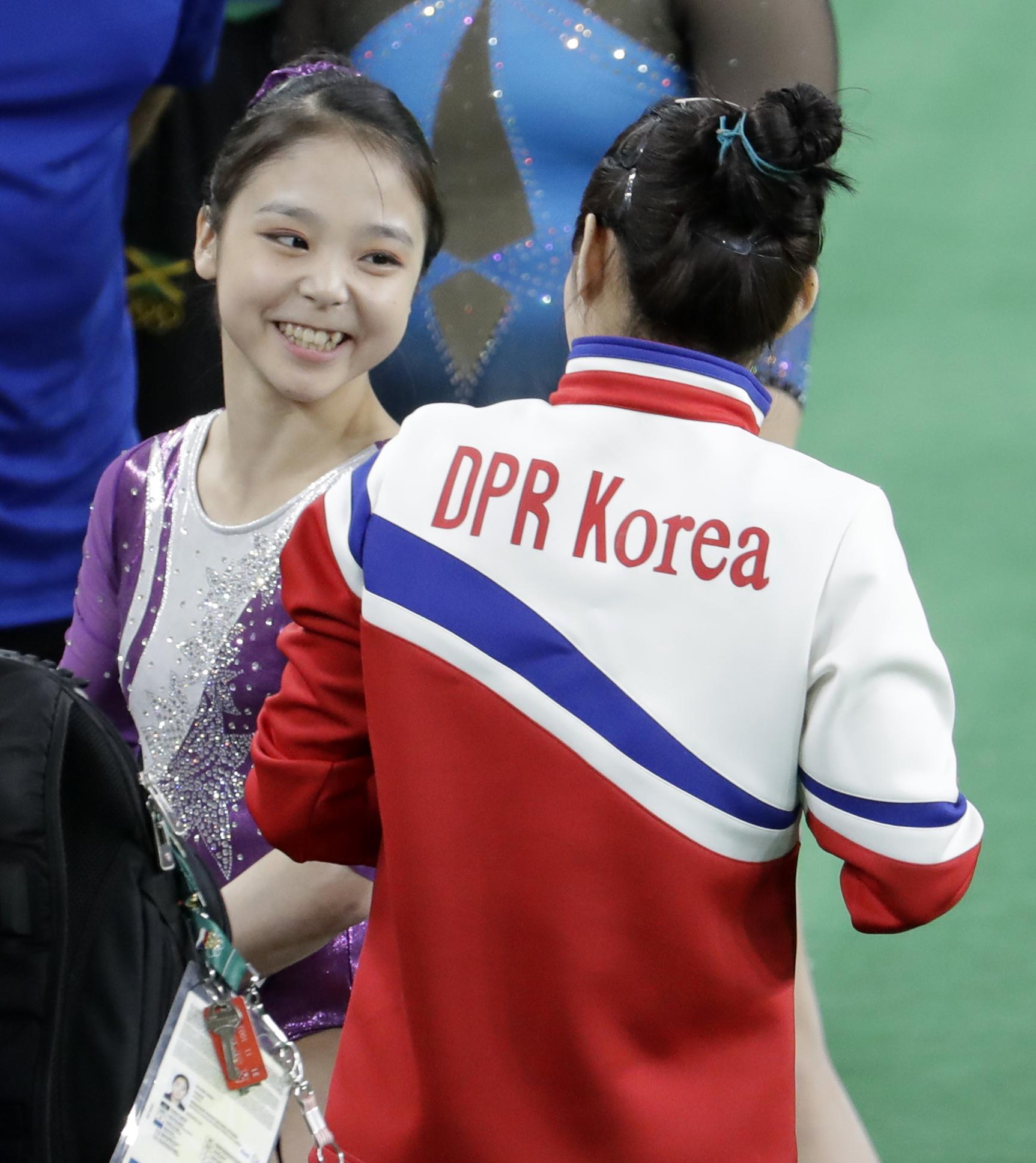 South Korea’s Lee Eun-ju, left, shares a moment with North Korea’s Hong Un Jong before requesting a selfie