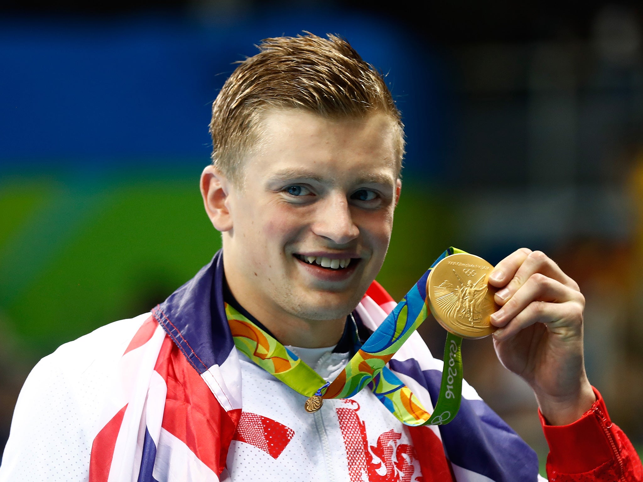 Peaty shows off his gold medal with pride