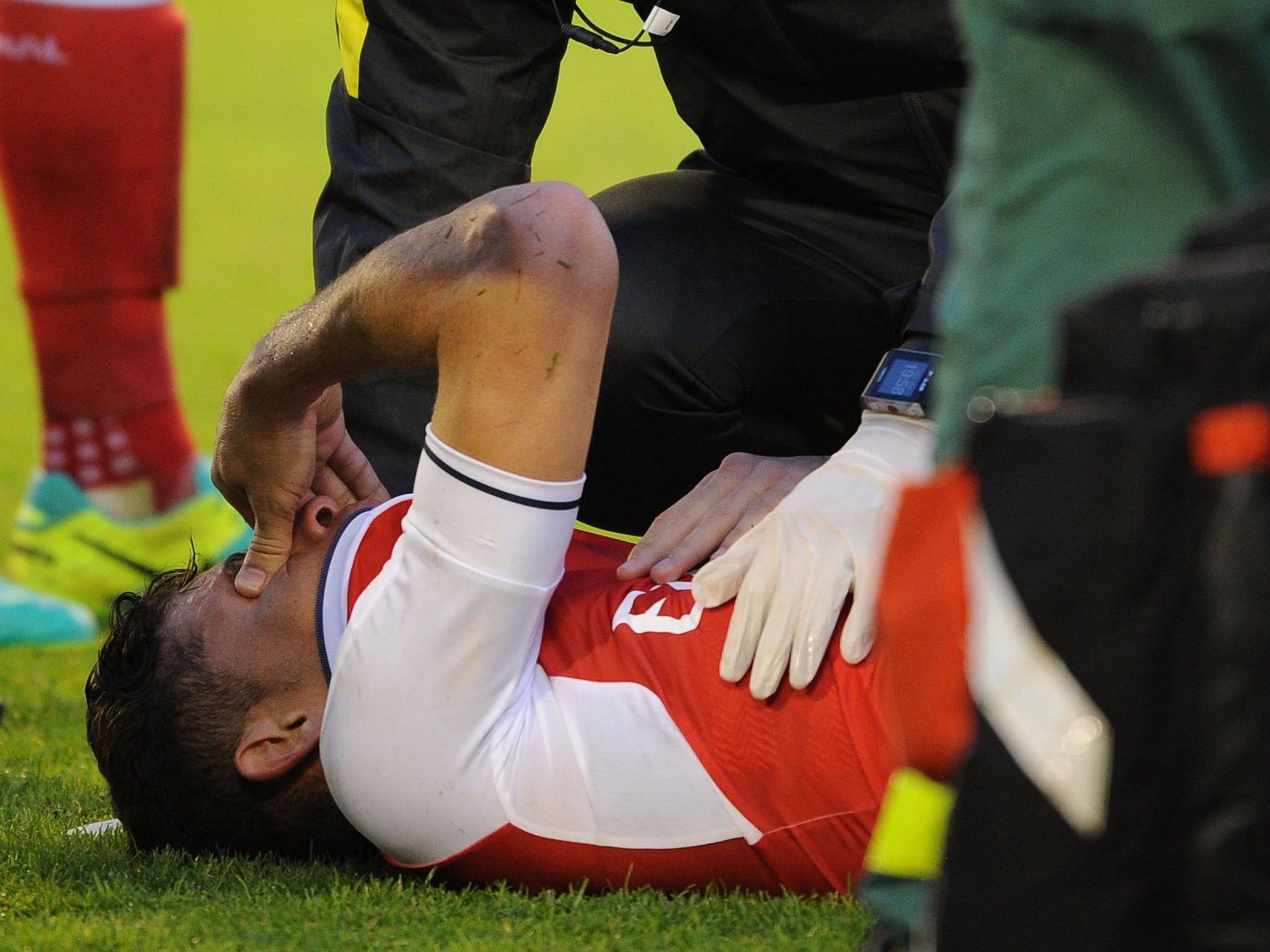 Gabriel was treated on the pitch by medical staff during Sunday's win