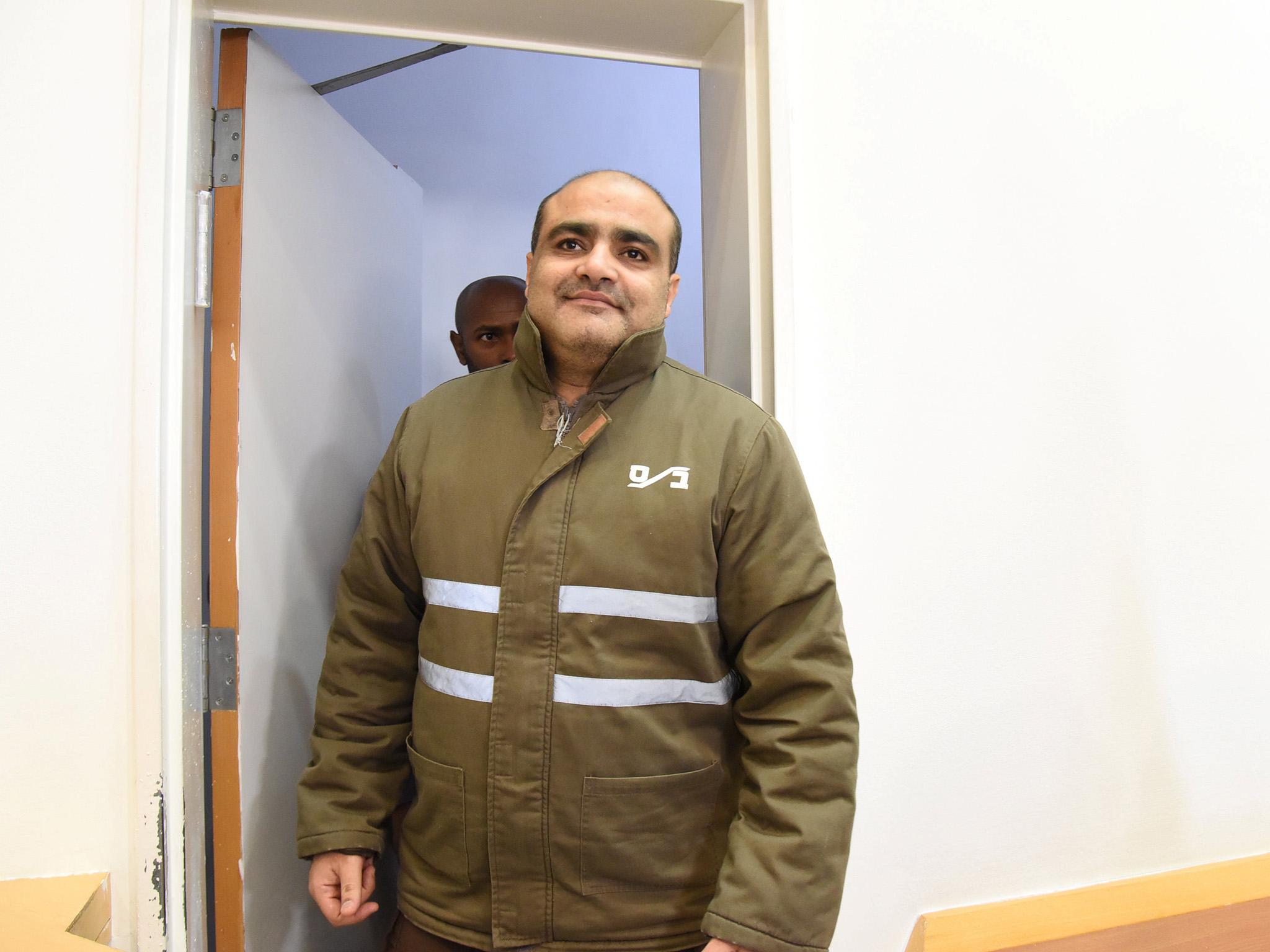 Palestinian Mohammad El Halabi (C), a manager of operations in the Gaza Strip for World Vision