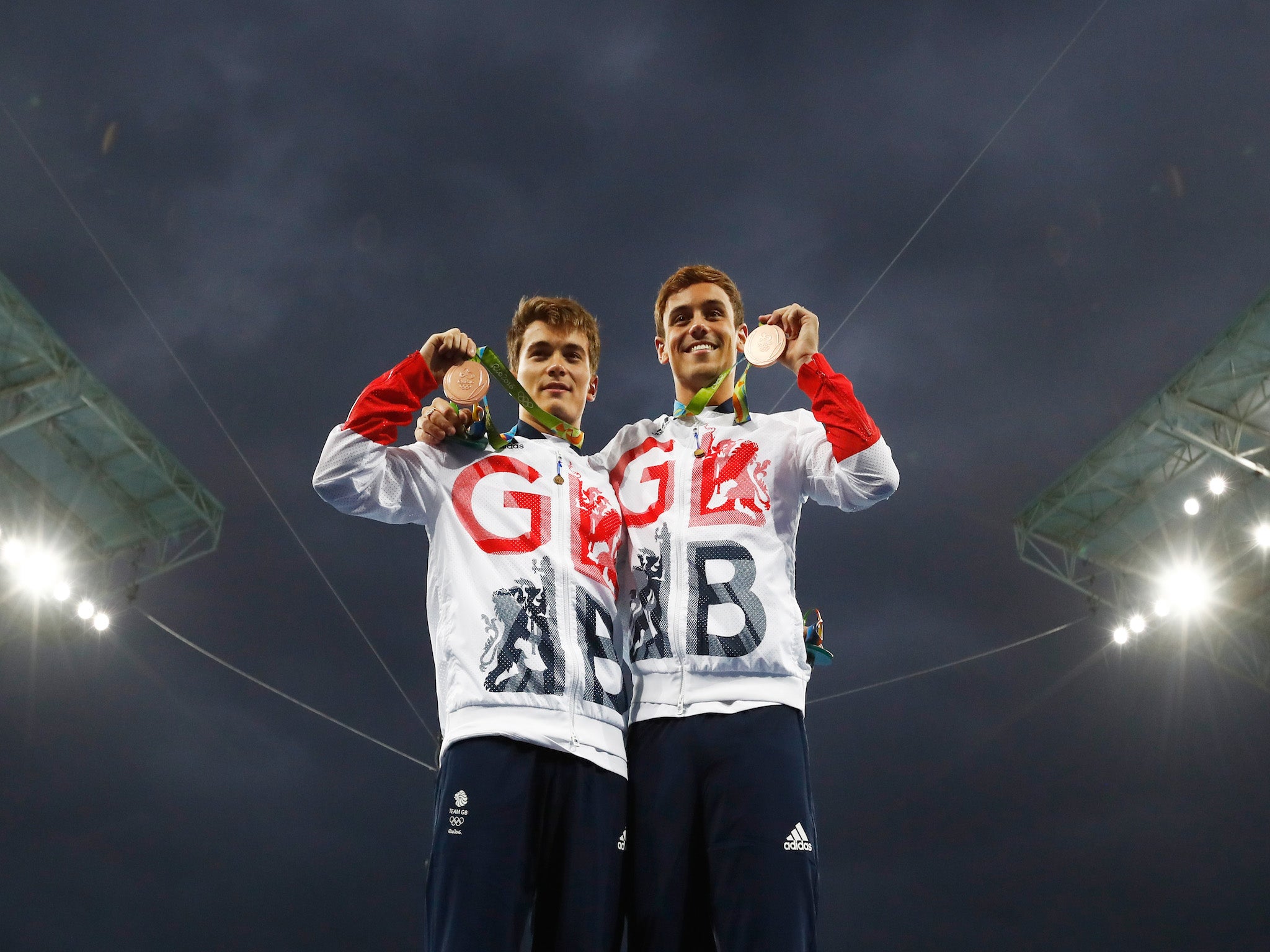 Dan Goodfellow and Tom Daley show off their bronze medals