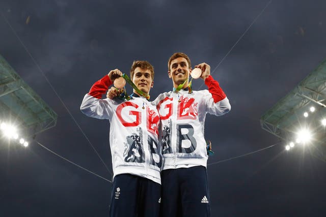 Dan Goodfellow and Tom Daley show off their bronze medals