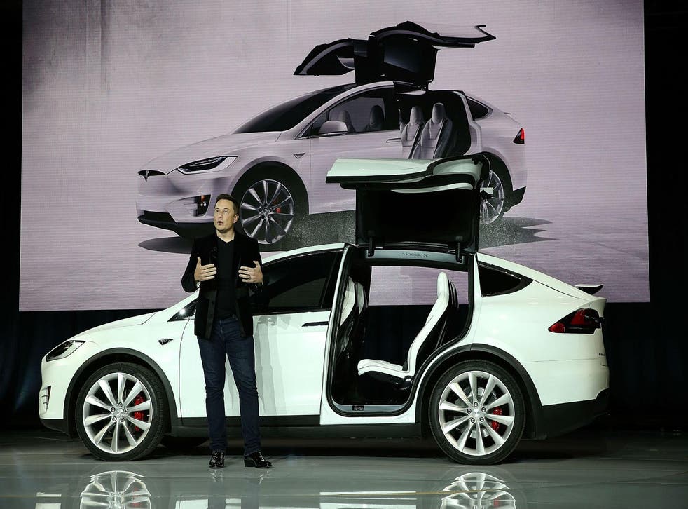 Tesla CEO Elon Musk unveils the company's Model X vehicle at an event in California in 2015