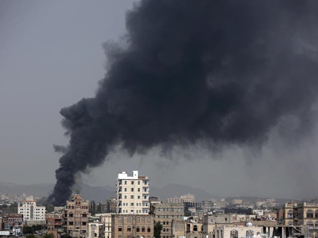 Smoke rises from a food factory in Sanaa, Yemen, where 14 people were killed by a Saudi Arabian airstrike
