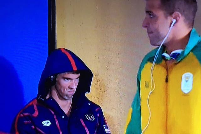 Michael Phelps glares at Chad le Clos minutes before their 200m butterfly semi-final