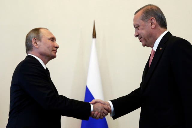 Mr Putin, left, met Mr Erdogan in the Konstantin palace outside St Petersburg