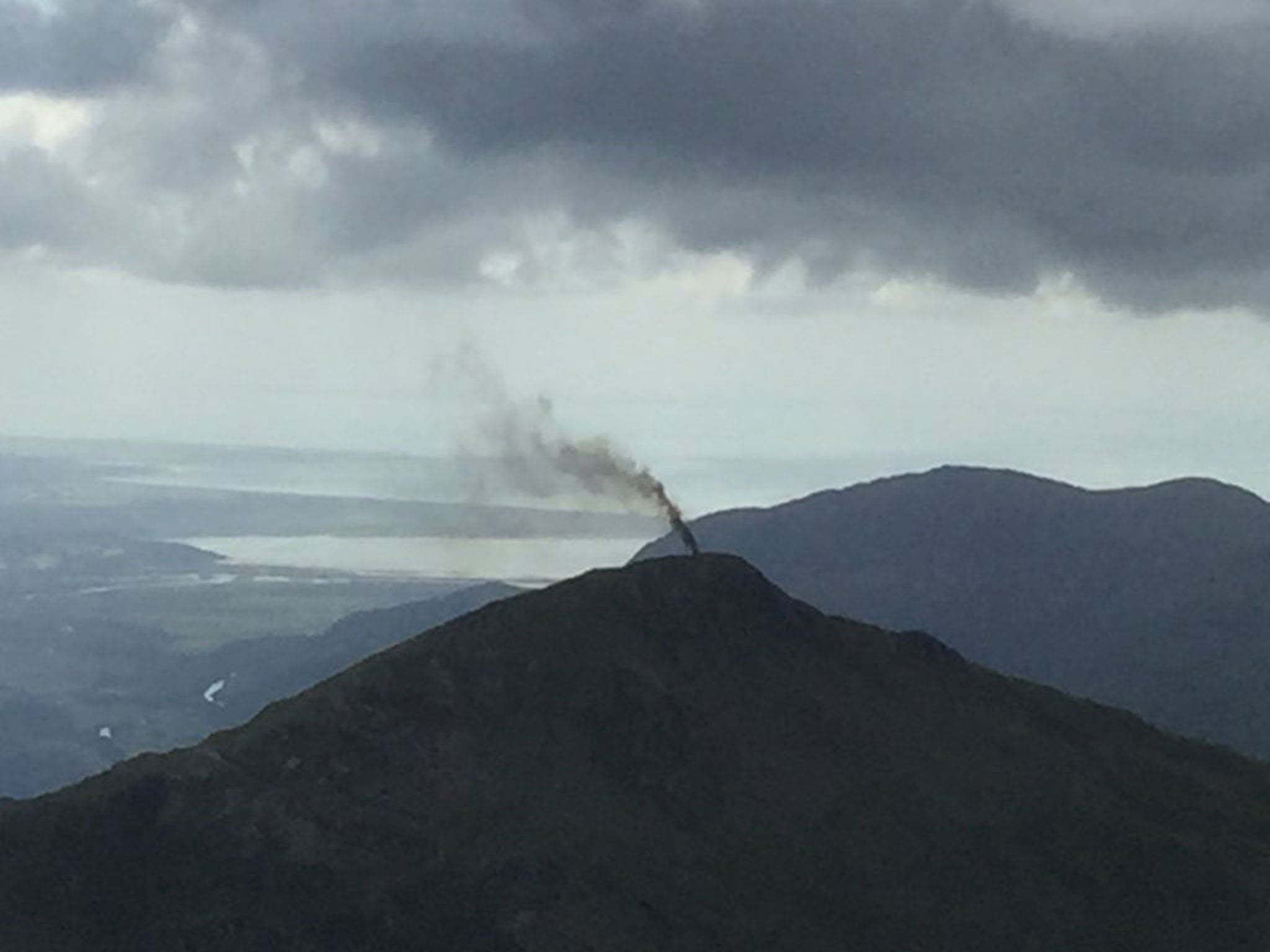 A fire on a peak in Snowdonia following a reported helicopter crash on 9 August