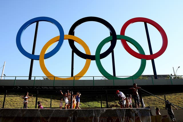 The Olympic Rings rise above Madureira Park, Rio de Janeiro