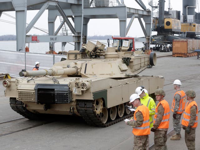 <p>An Abrams main battle tank, for U.S. troops deployed in the Baltics as part of Nato's Operation Atlantic Resolve, leaves Riga port</p>