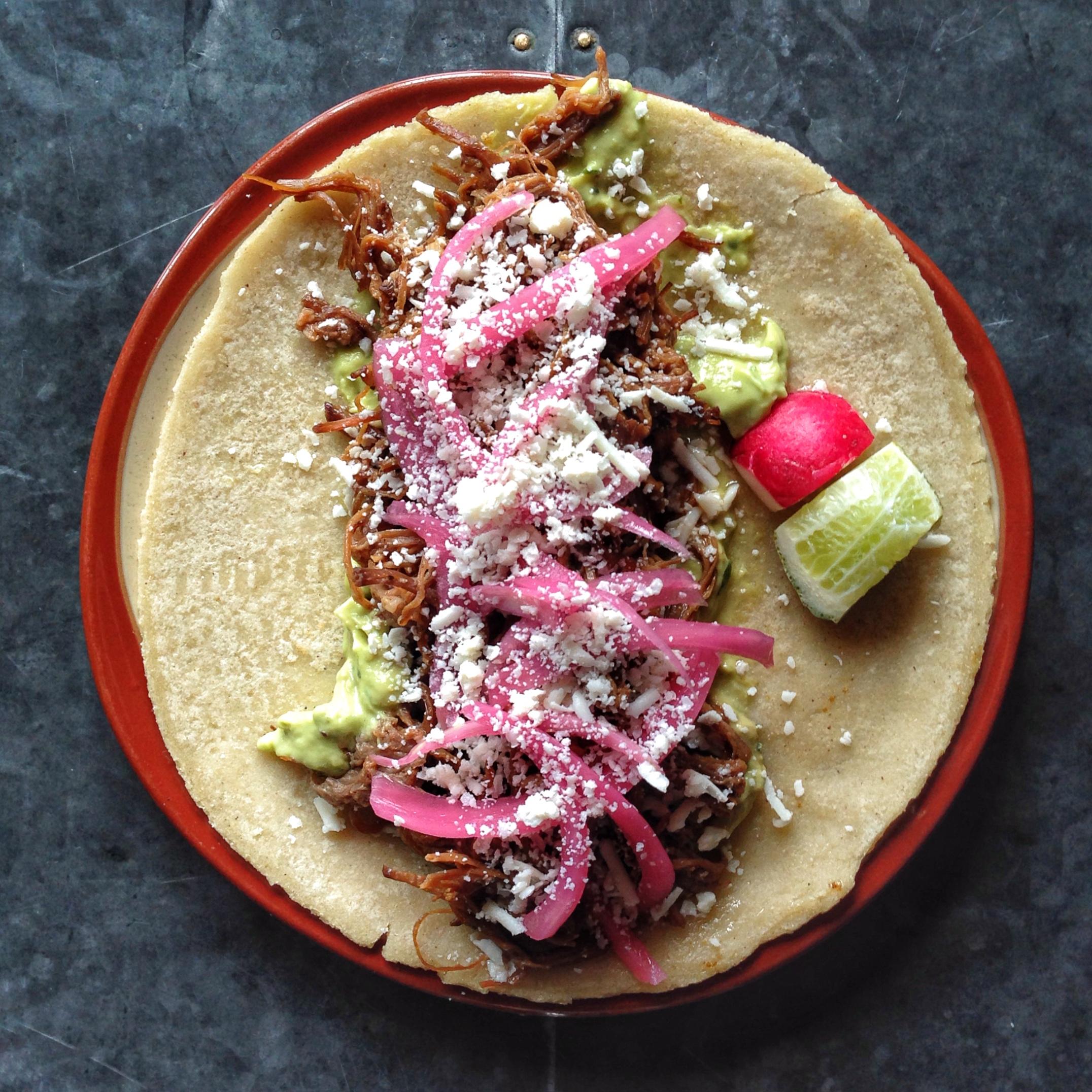 Smoked brisket tacos at Lone Star pair best with a Margarita - preferably served in a mug