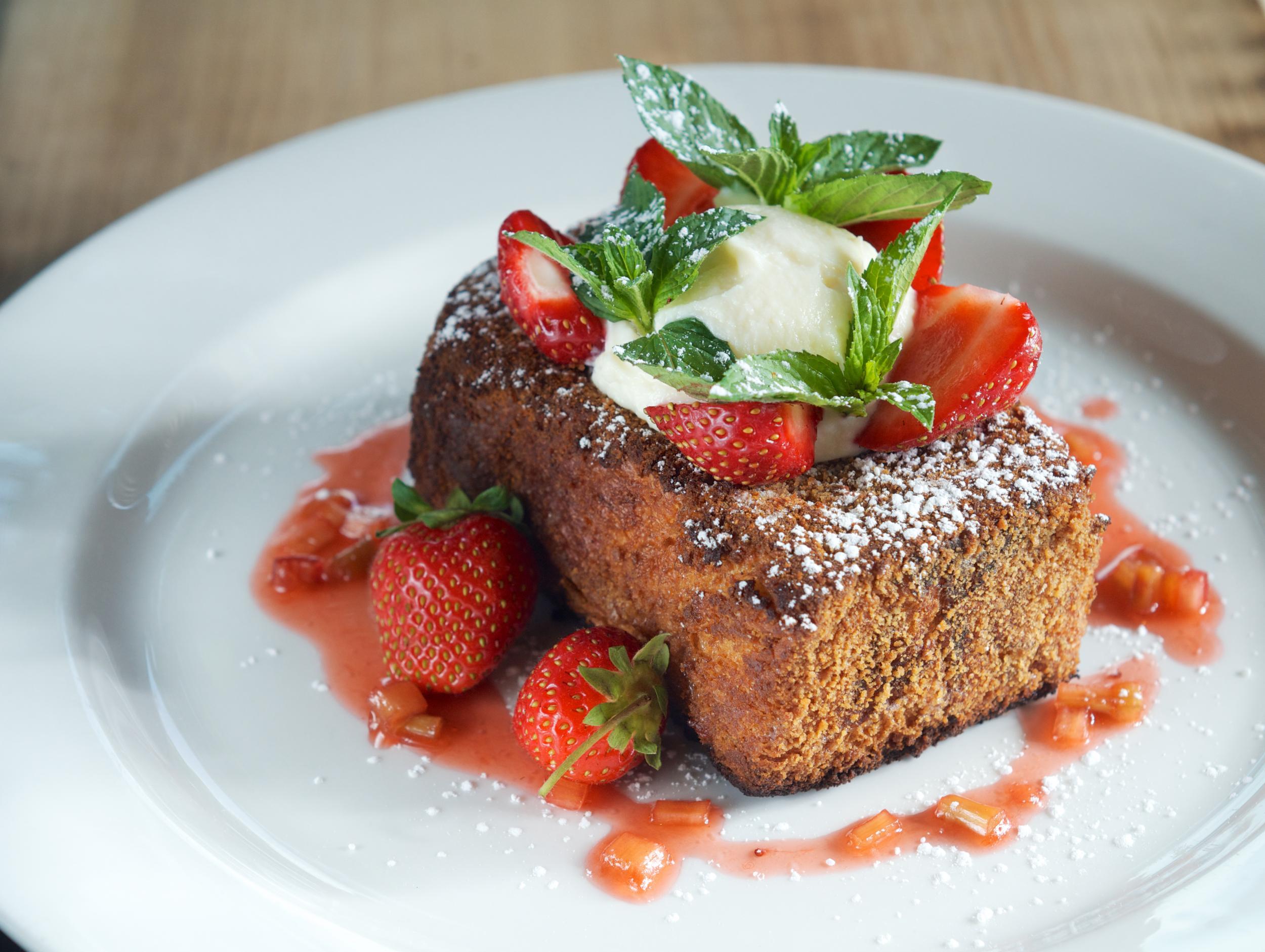 French toast, Boston-style: Graham cracker crusted challah with Amaretto Chantilly and toasted almonds