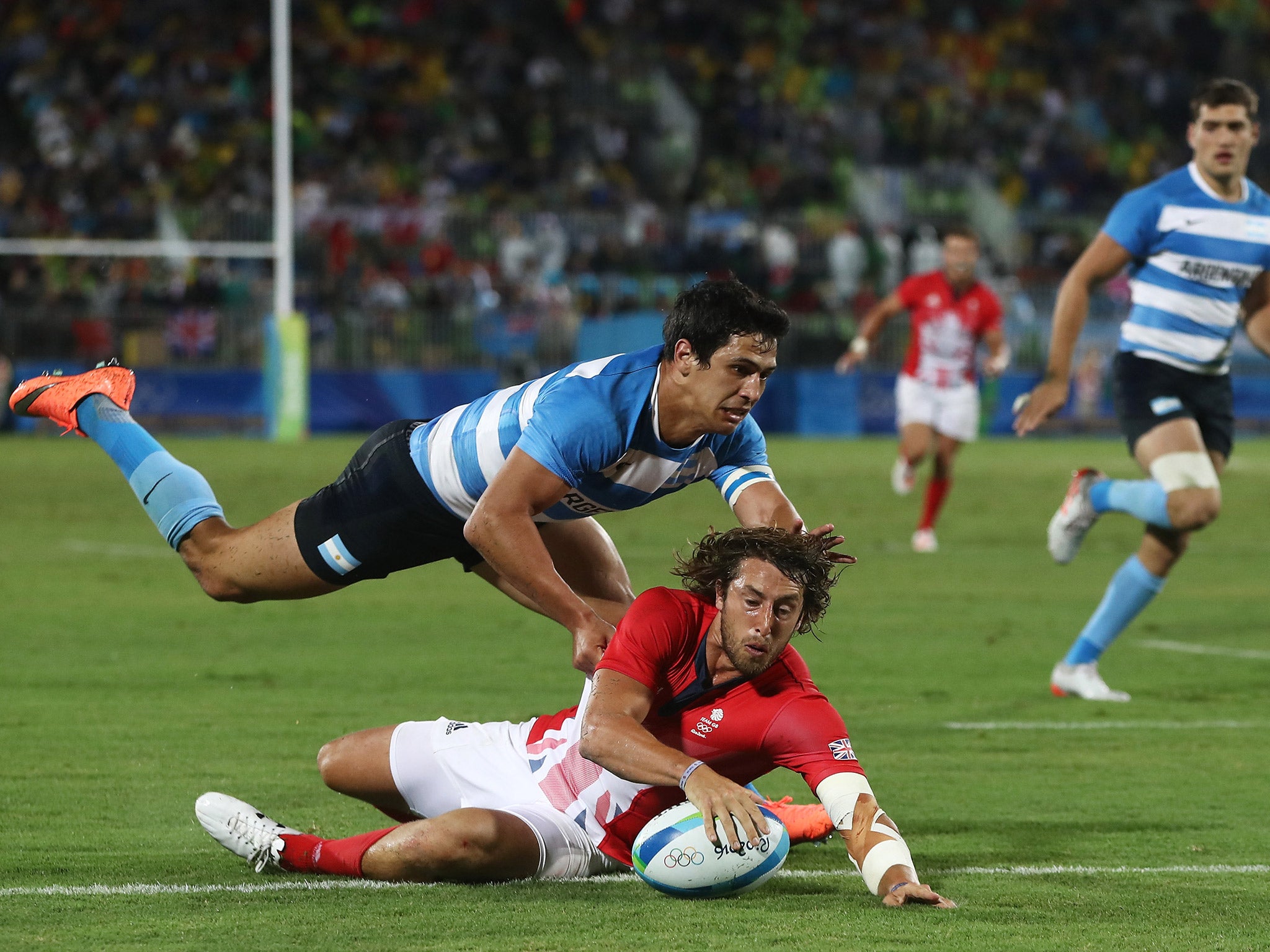 Dan Bibbey scores the match-winning try in Team GB's 5-0 victory over Argentina