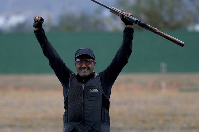 Fehaid Al Deehani reacts to winning the Double Trap event