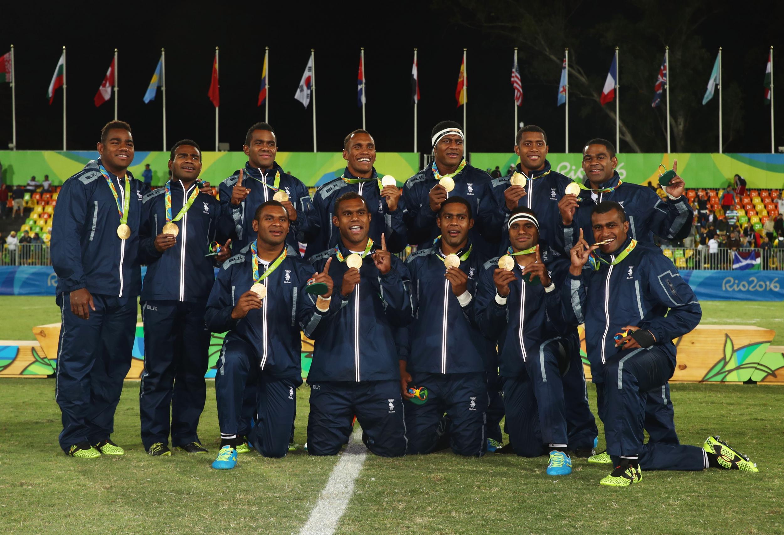 The Fiji rugby sevens team with their gold medals
