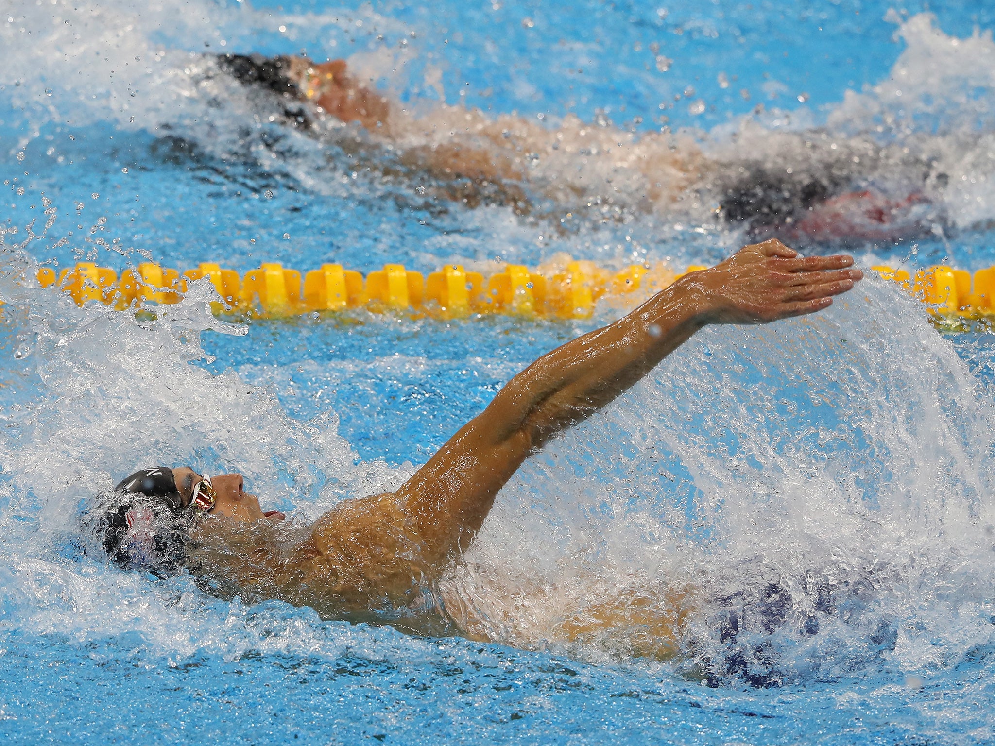 Phelps and Lochte competing in the men's 200m individual relay