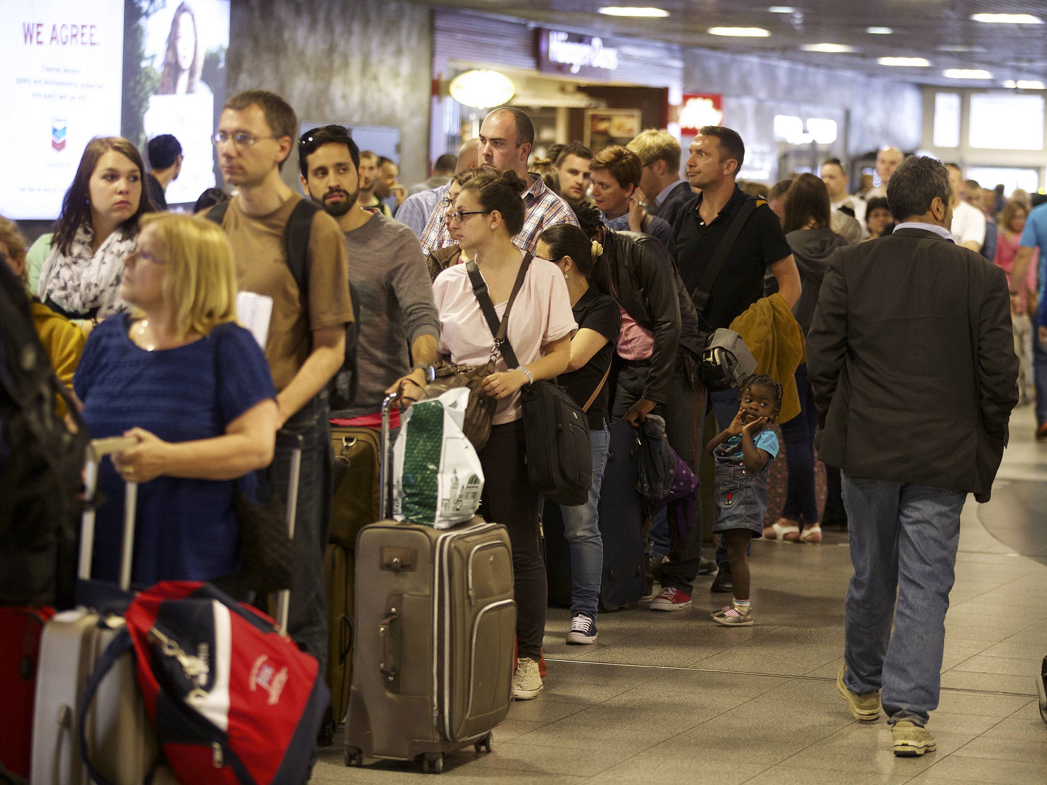 People waiting for a Eurostar train during a 24 hour strike