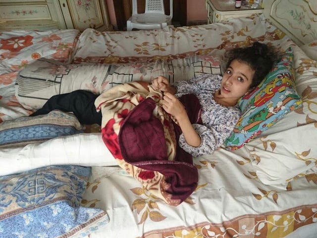 Ghina at home in Madaya, Syria
