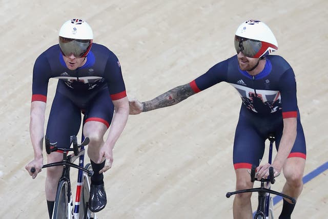 Bradley Wiggins is congratulated by his teammate