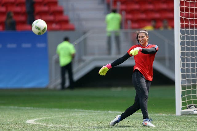 Solo warms up before the US team's penalty shootout defeat in Brasilia