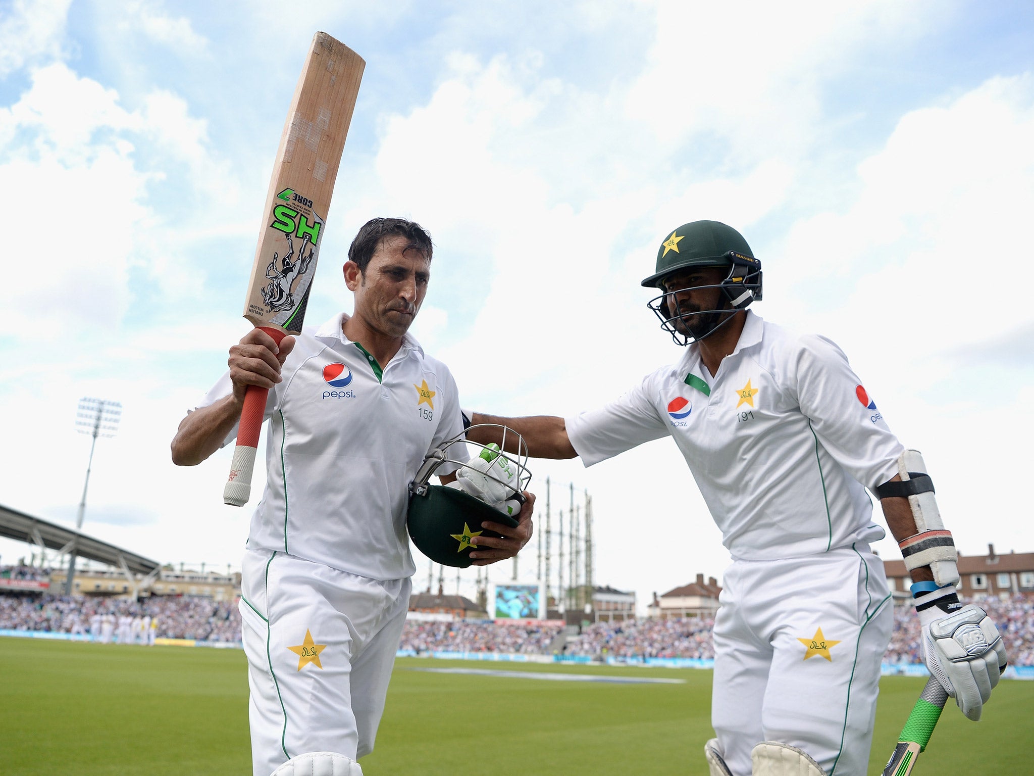 Younus Khan is congratulated as he leaves the field at The Oval