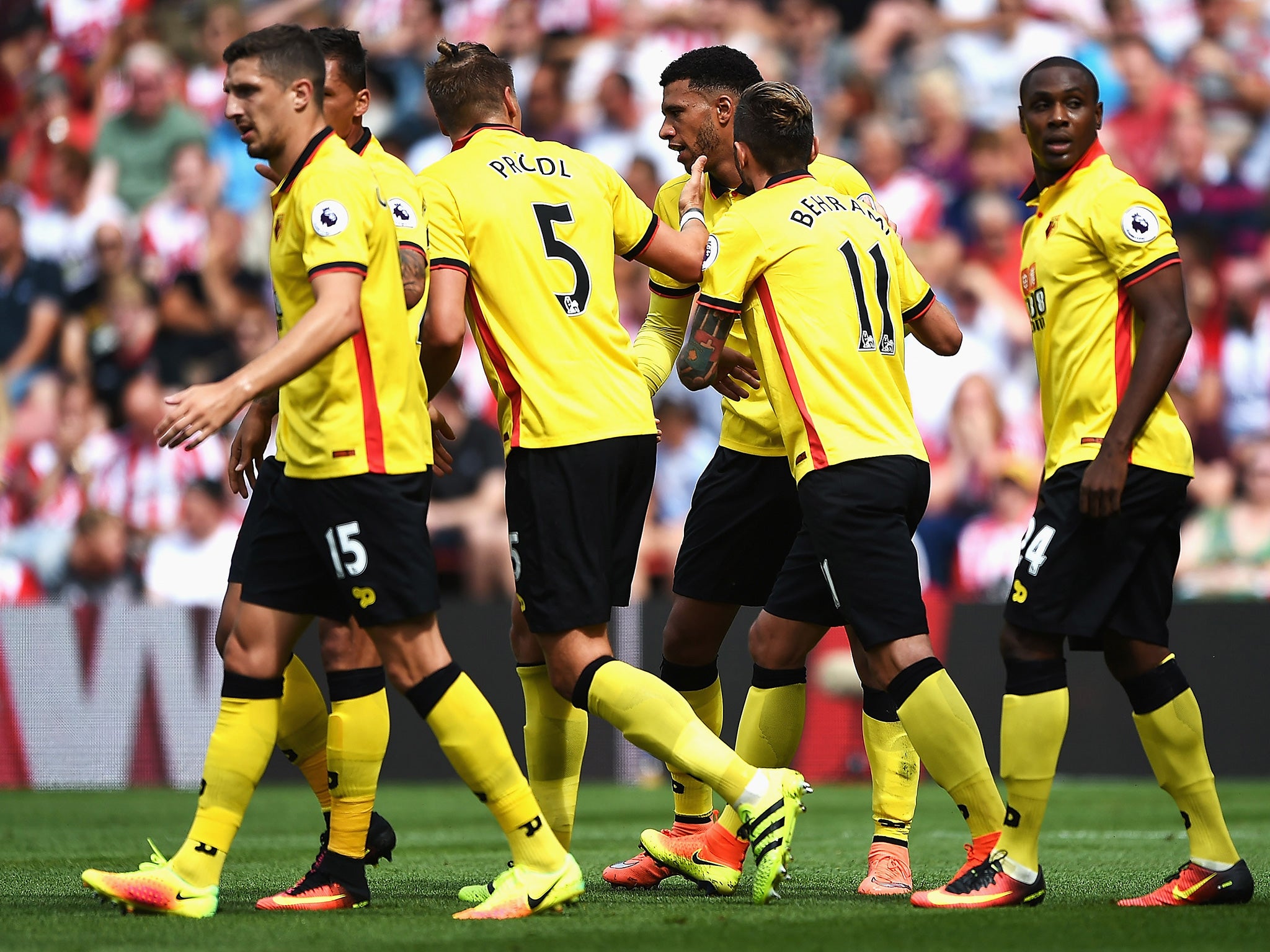 Watford's players celebrate Capoue's opener