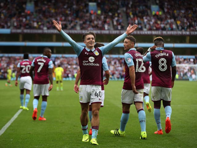 Jack Grealish celebrates after scoring in Aston Villa's 3-0 win over Rotherham