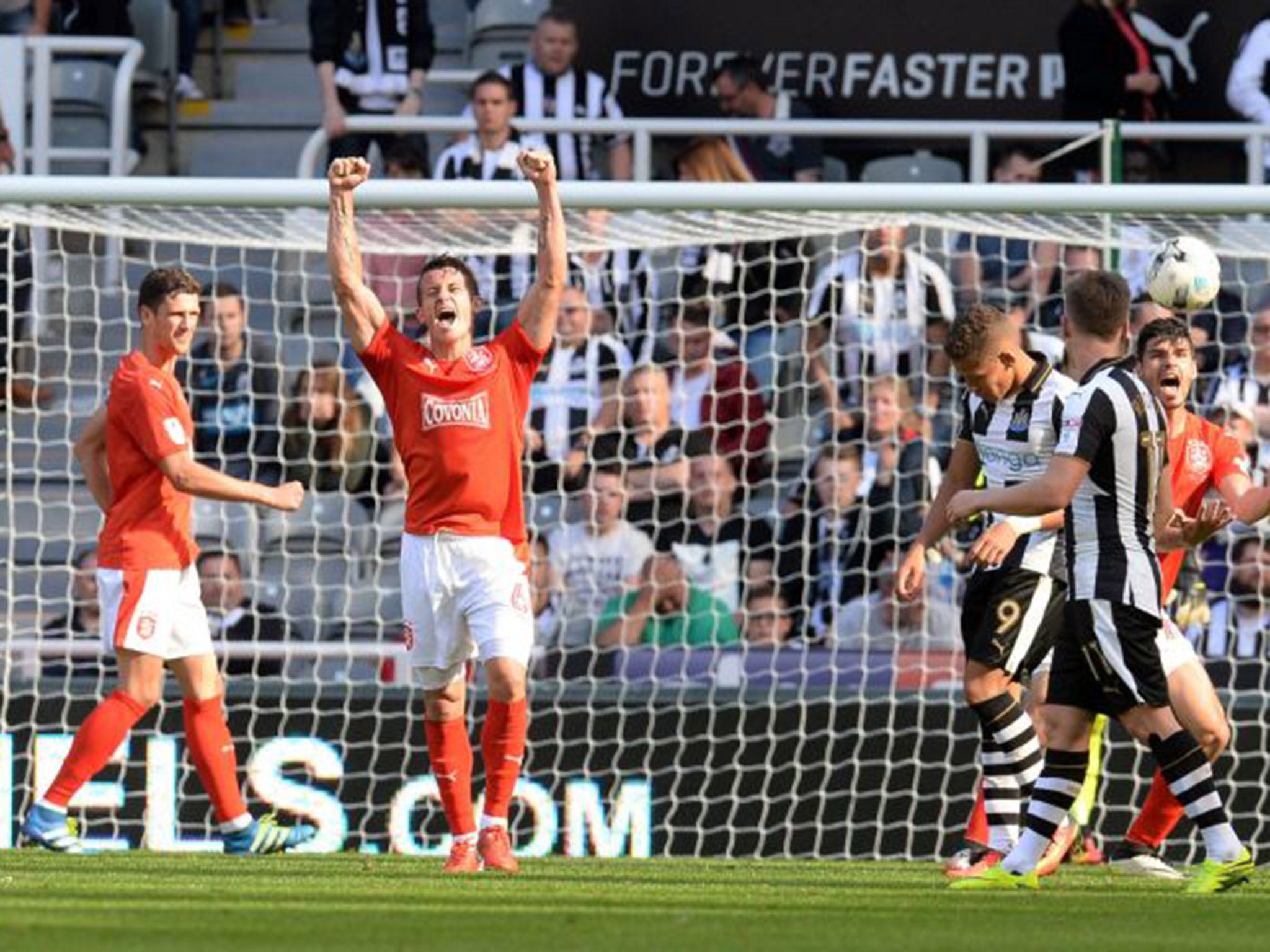 Jonathan Hogg celebrates Huddersfield's victory over Newcastle
