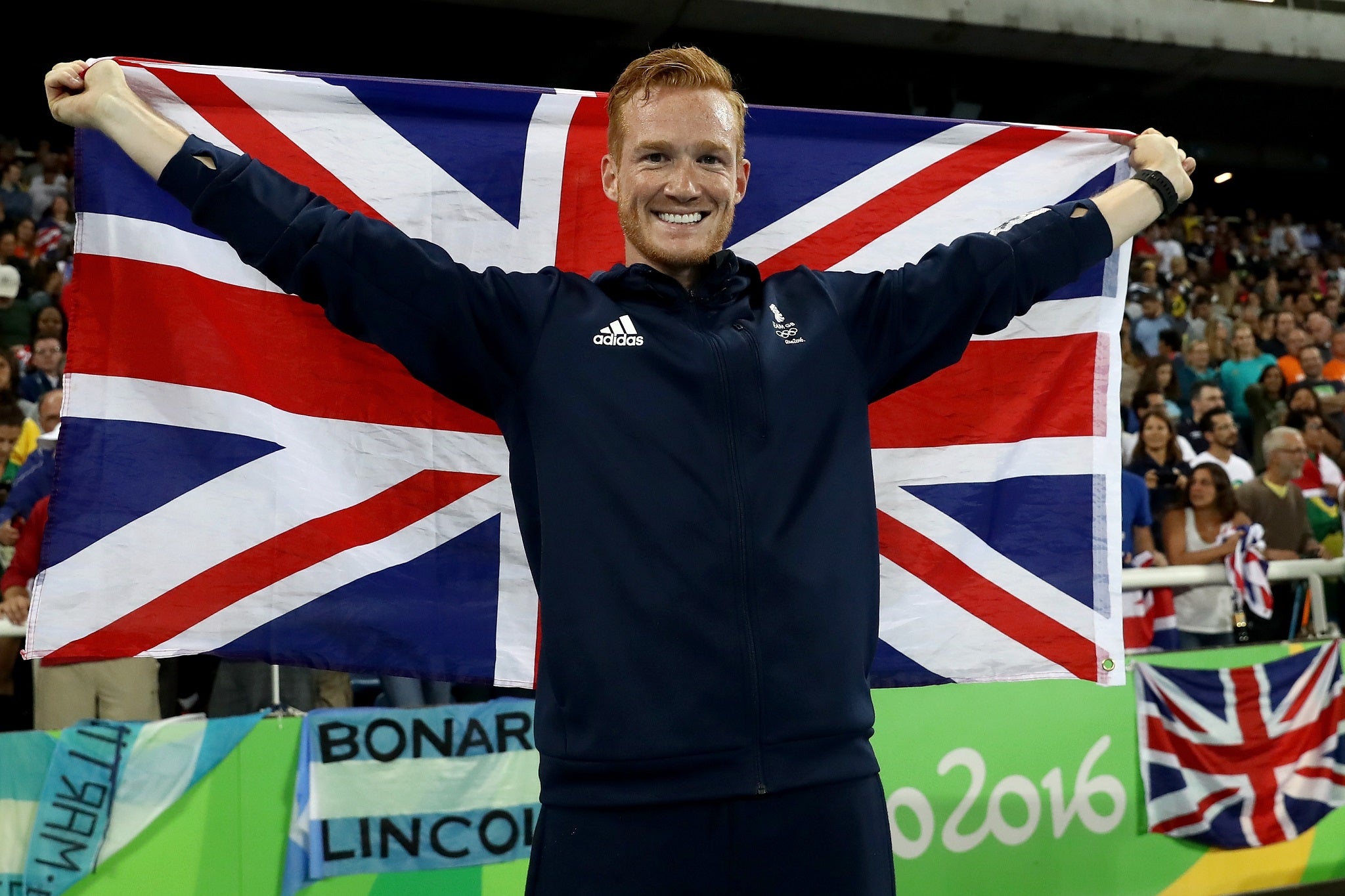 Greg Rutherford celebrates after clinching bronze in the men's long jump