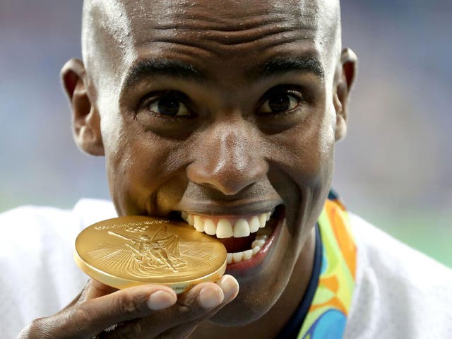 Team GB's Mo Farah with his gold medal following the Men’s 10,000m final