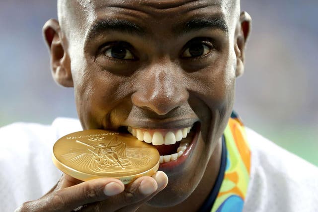 Team GB's Mo Farah with his gold medal following the Men’s 10,000m final