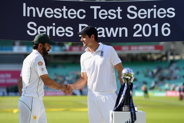 Pakistan captain Misbah-ul-Haq and England captain Alastair Cook share the series trophy after the 4th Investec Test 