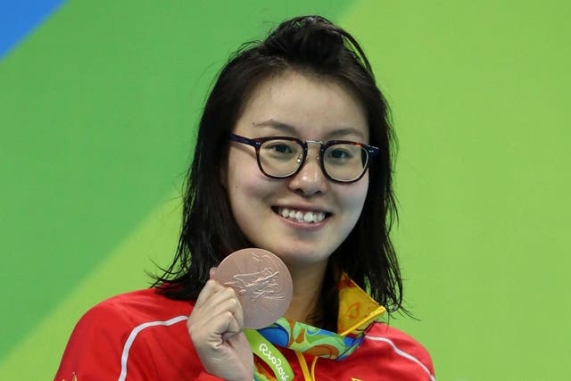 Fu Yuanhui with her bronze medal after the women's 100m backstroke final