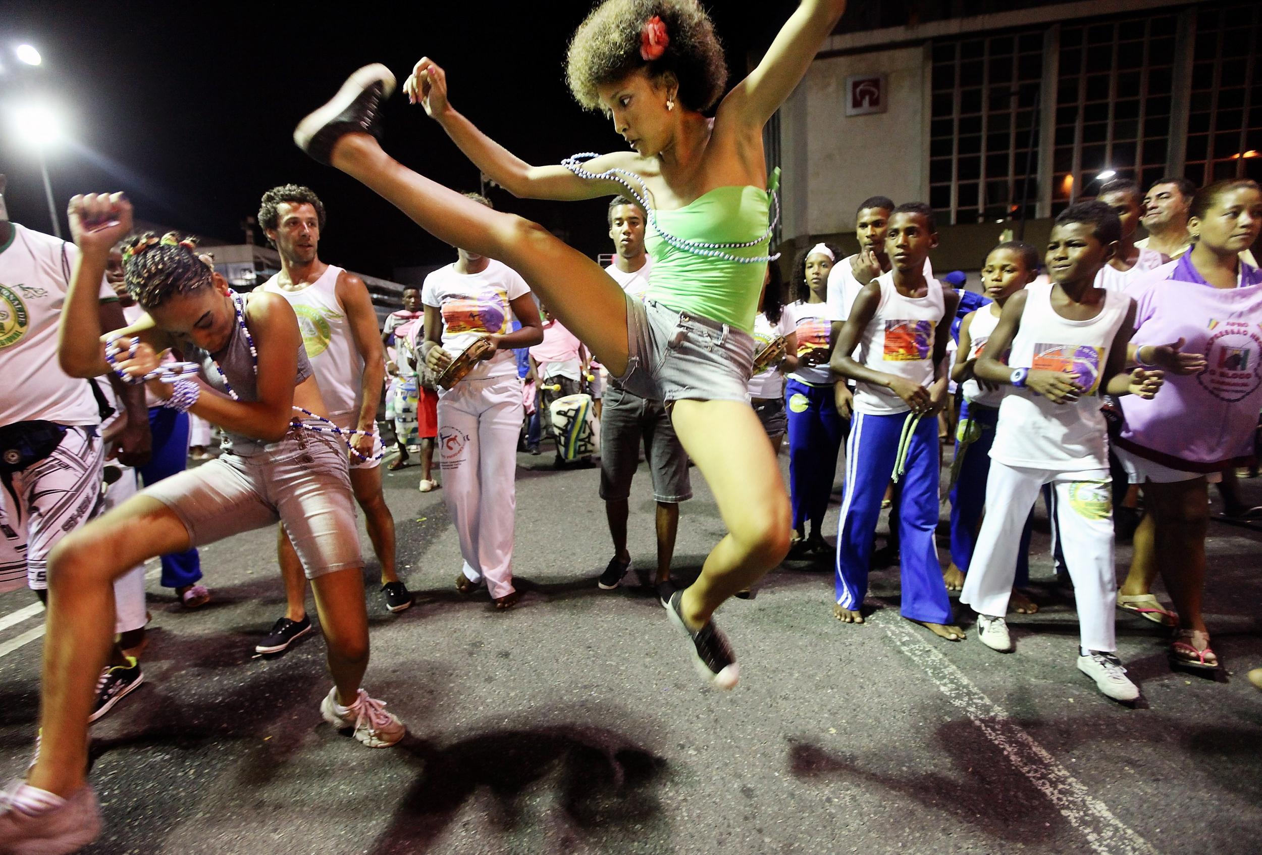 Capoeira - a Brazilian art combining martial arts and dance, first developed by African slaves in the Portuguese colony - is a common sight on the streets of Salvador