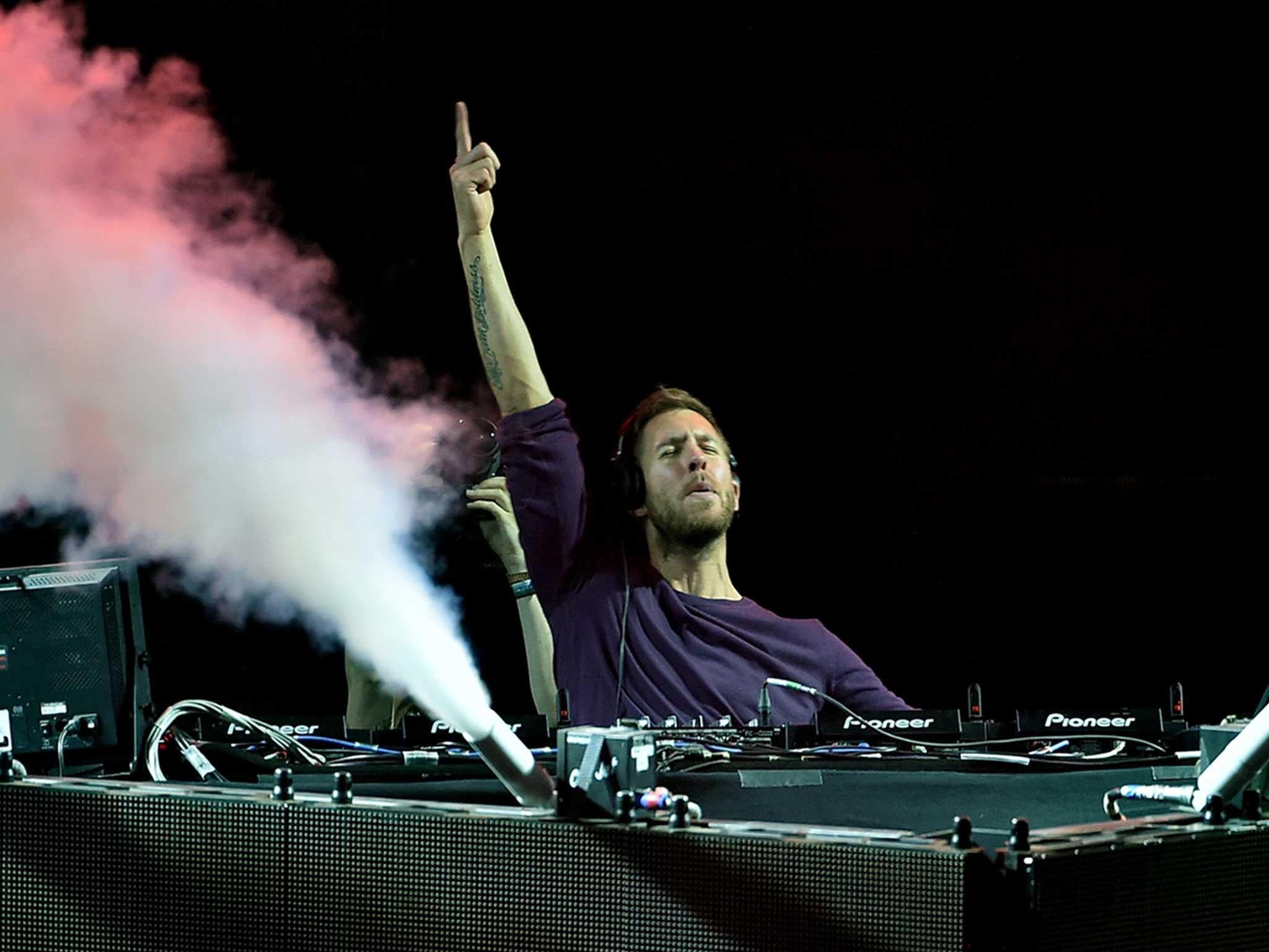 Calvin Harris plays at a festival