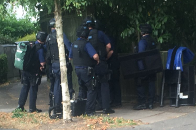 Armed police officers spotted outside a property in Wimbledon, south west London