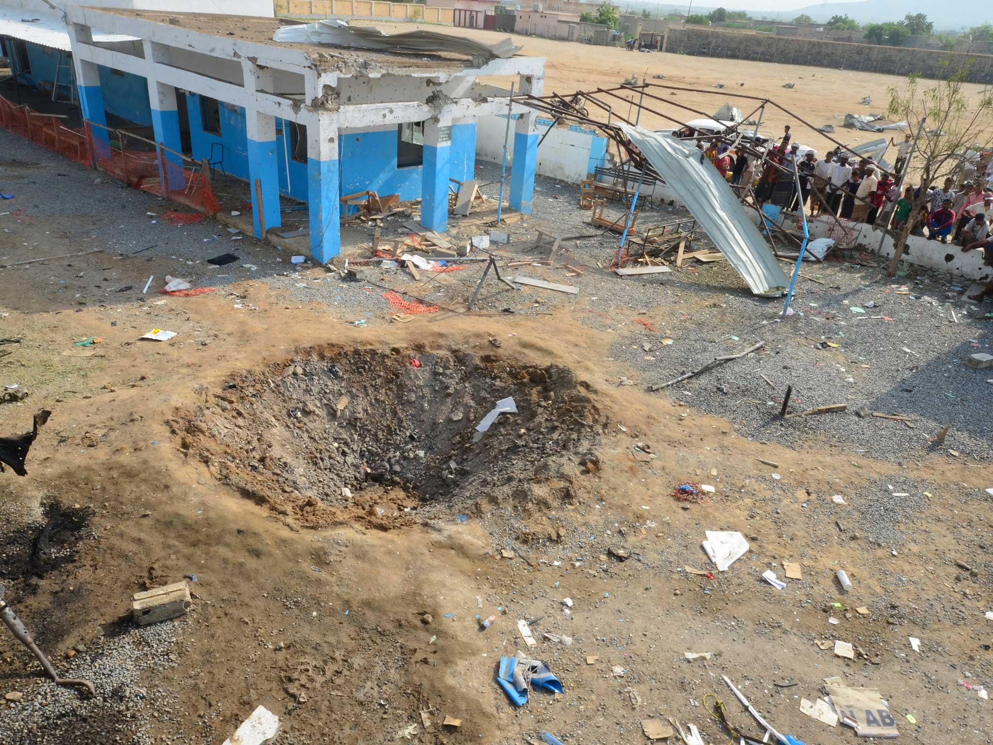 A crater caused by a Saudi-led air strike in August that hit a hospital yard in Hajjah province