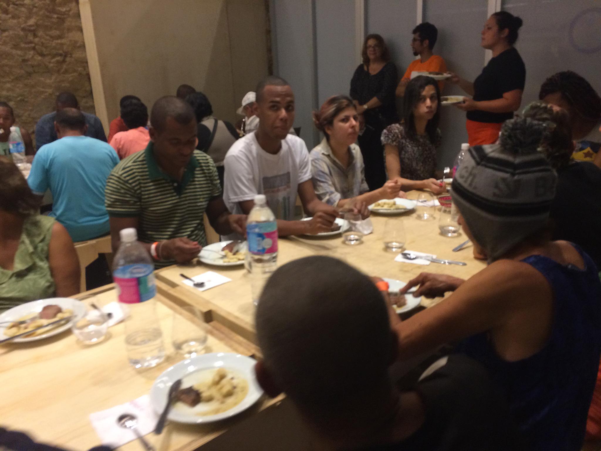 Homeless guests dine at the Refettorio Gastromotiva