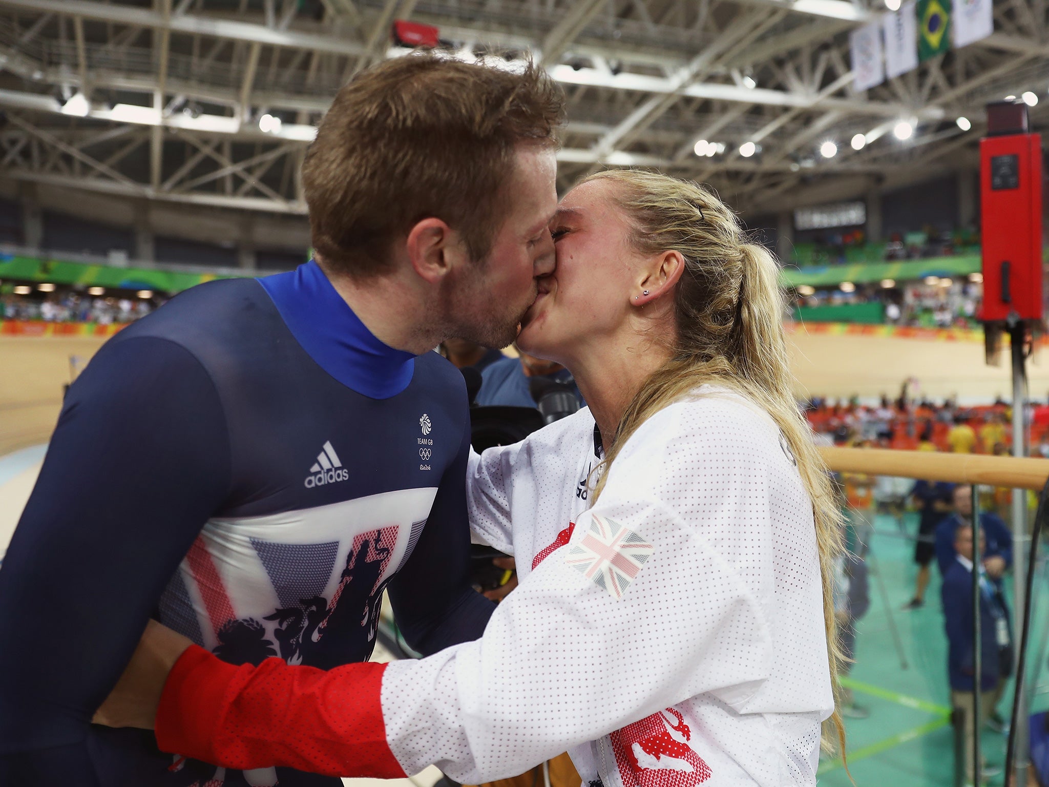 Kenny and Trott seal their golden night with a kiss