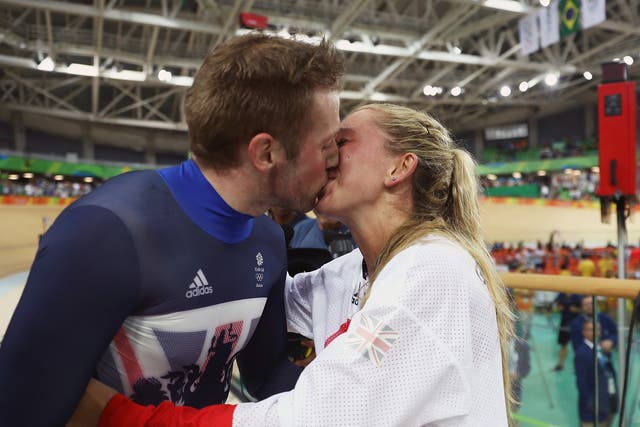 Kenny and Trott seal their golden night with a kiss