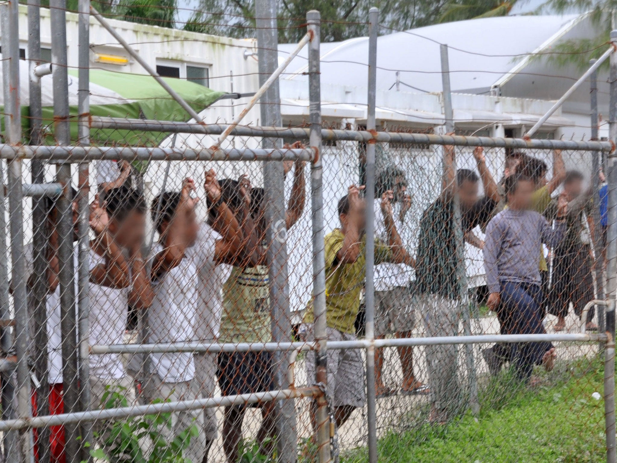 File photo of refugees in an Australian detention centre on Manus Island. Mr Trump's order could place 1,000 people there in limbo once again