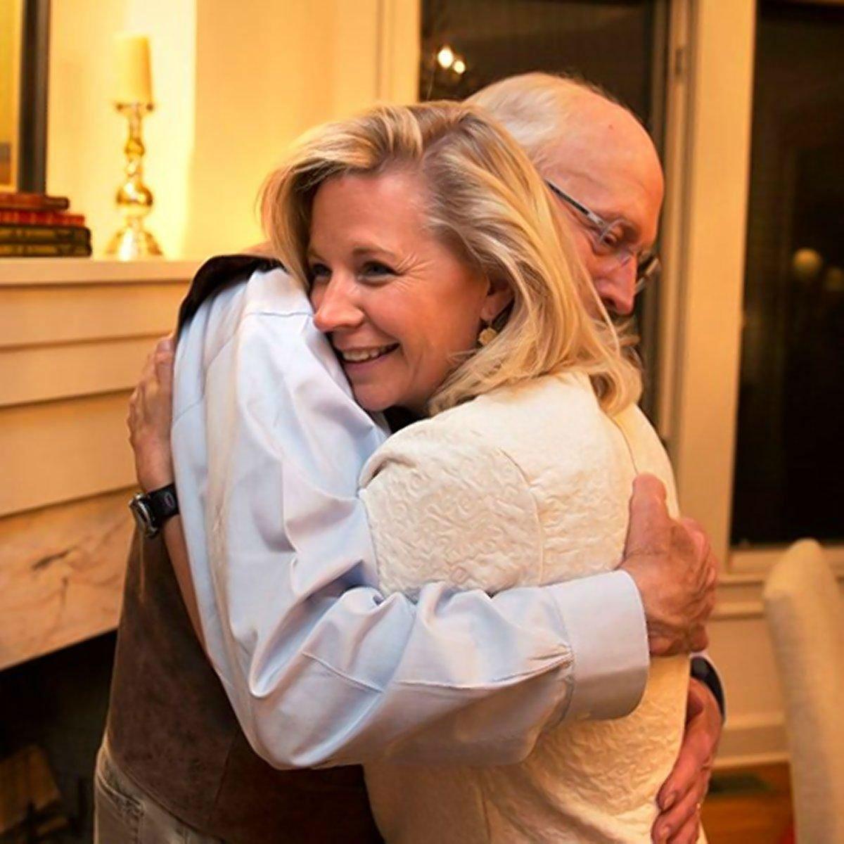 Liz Cheney gets a hug from her father after her victory