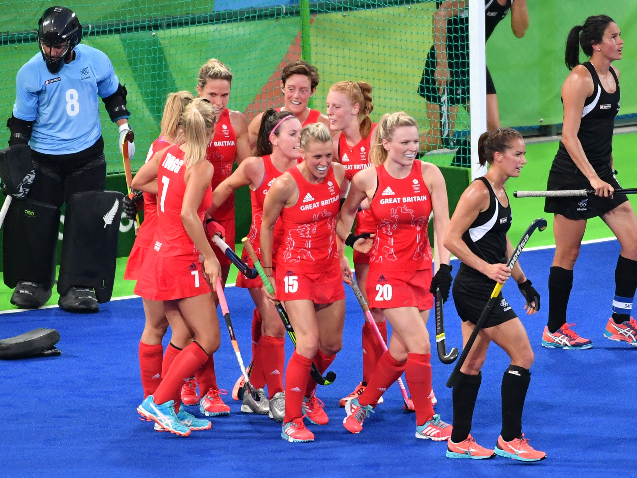 Great Britain's players congratulate each other on a famous victory