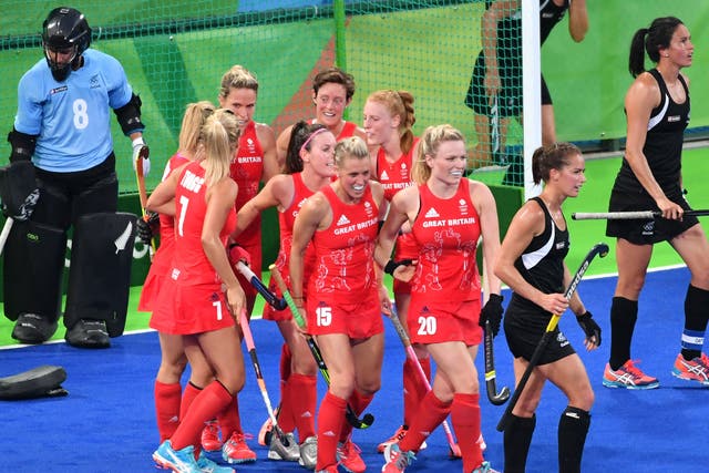 Great Britain's players congratulate each other on a famous victory