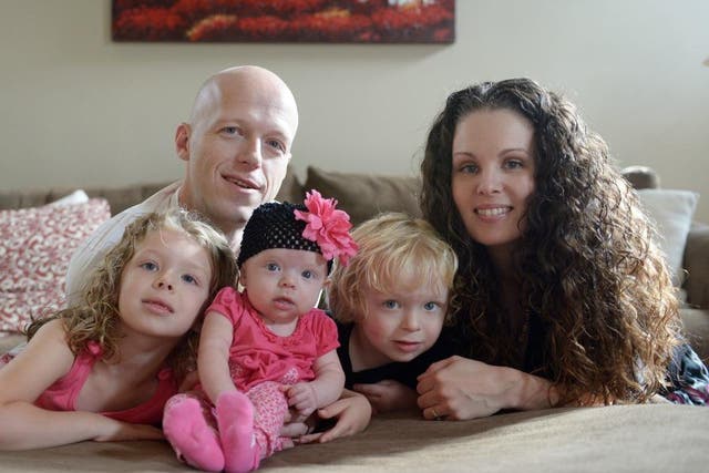Willow Short, 4-month-old, center, along with her parents Megan and Mark and sister Liana, 6, and brother Mark, 3